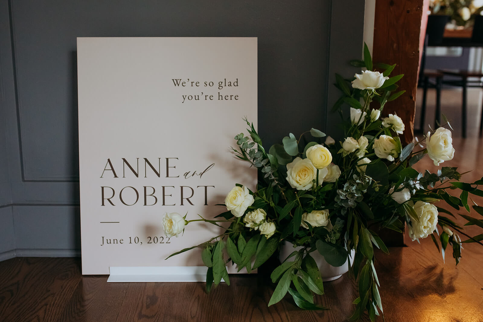 White welcome sign for intimate wedding at the Marian Built Loft in Seattle