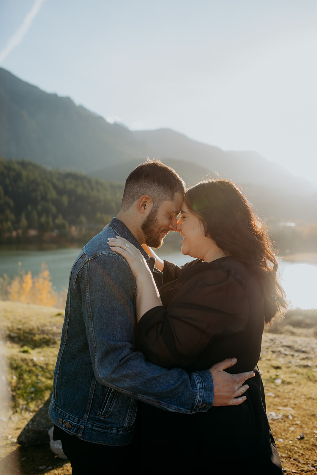 Couple embracing at engagement session at cascade locks