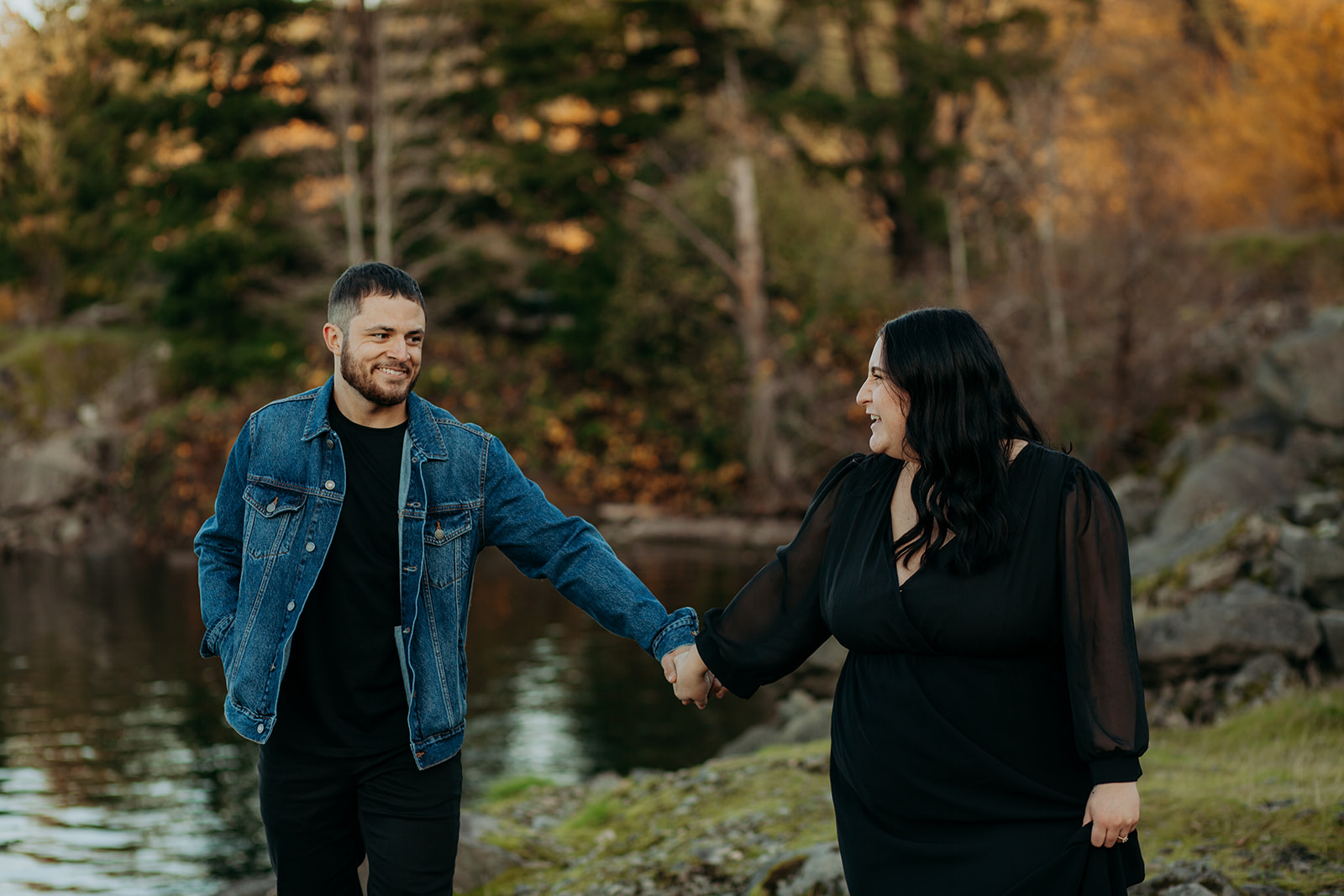 Couple holding hands at engagement session at cascade locks