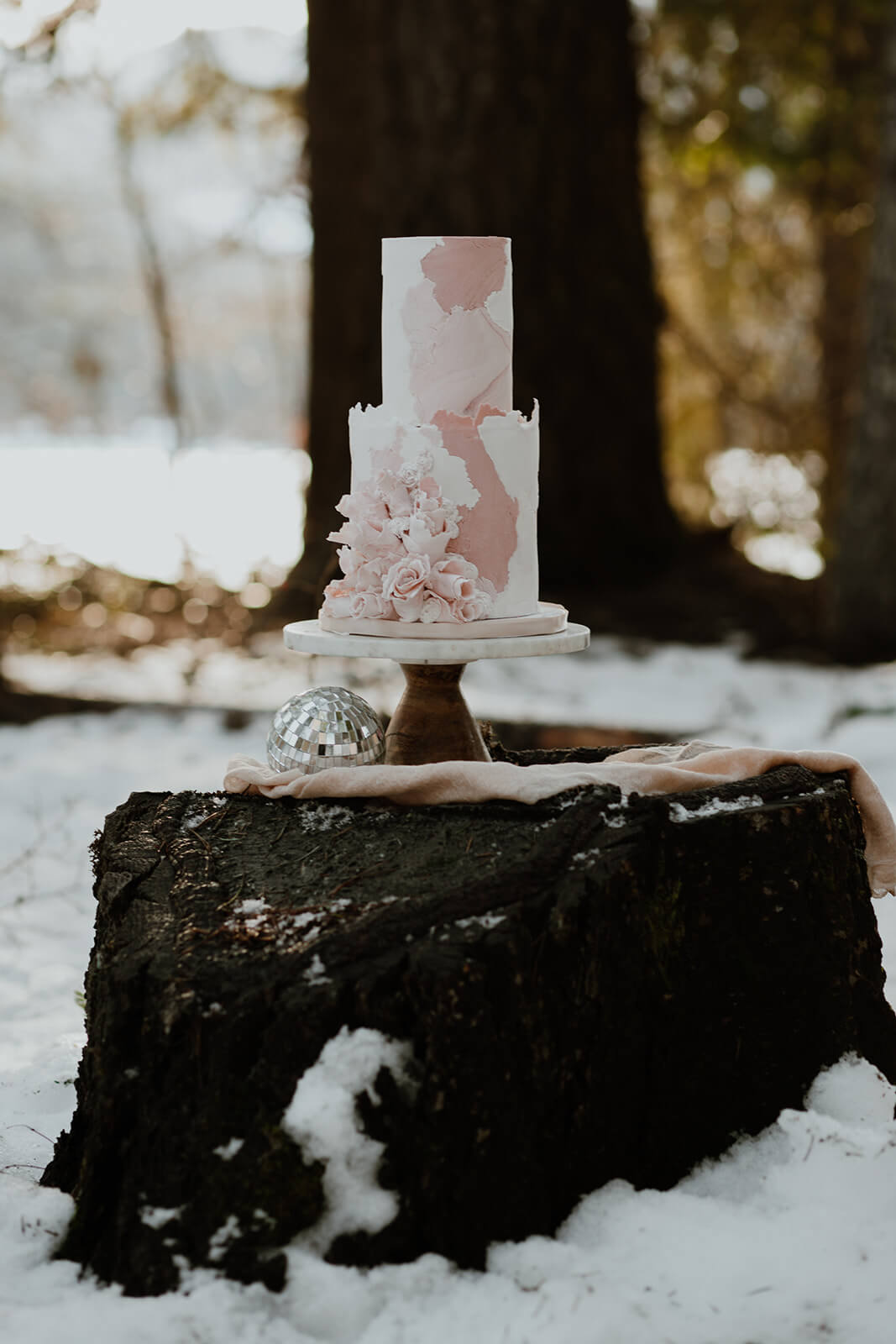 White and pink winter wedding cake