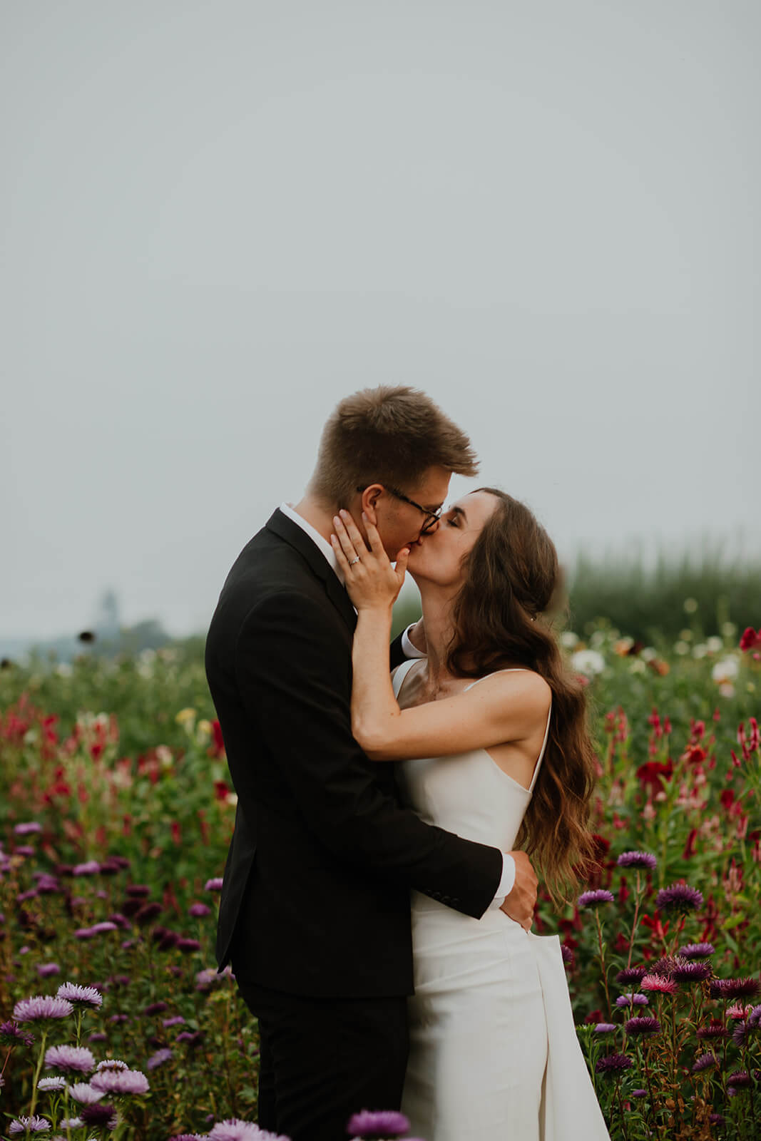 Bride and groom couple photos in flower field at Oregon family farm