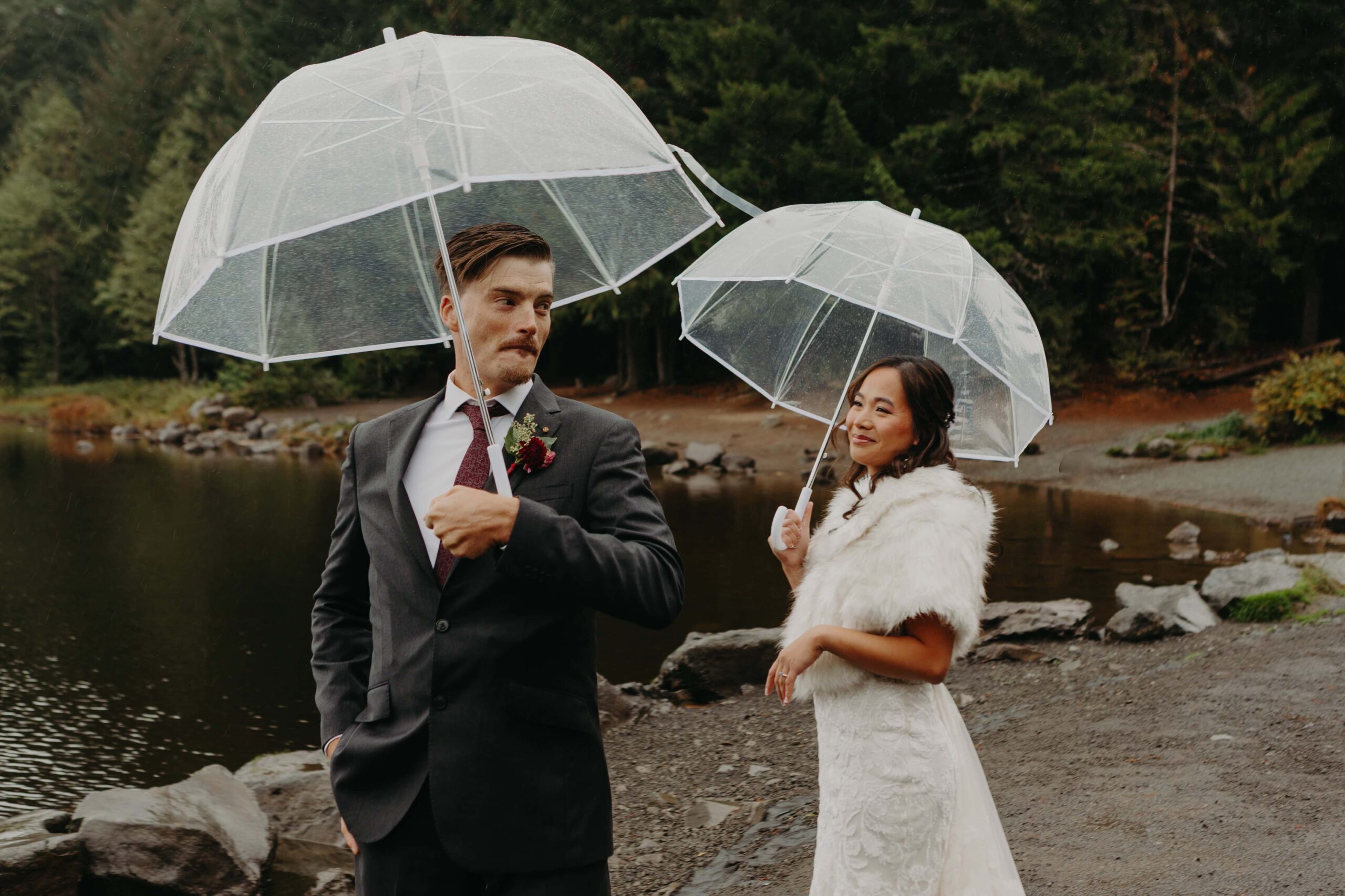 a groom excitedly starts to turn around to see his bride for their first look for this trillium lake elopement at mount hood